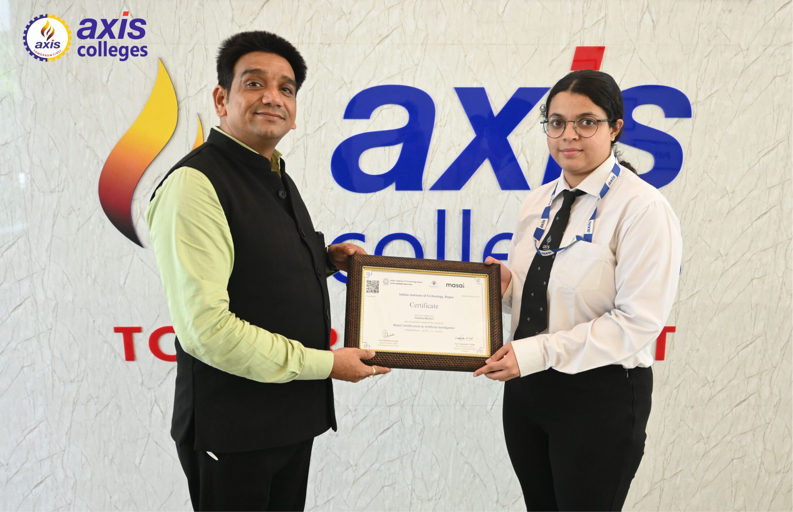 BBA Student Samiksha bhandari Receiving acknowledgement at Axis Campus